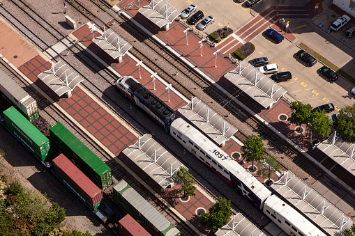 Dallas, Tx, USA - April 7, 2016: Aerial view of the Central Station in Dallas downtown with a Trinity Railway Express train. Texas, United States