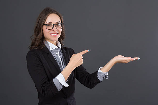 istock business women pointing an idea 539810208