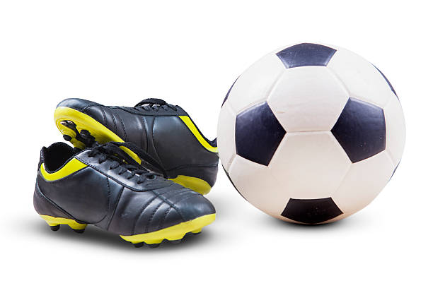 istock Soccer shoes and ball 539810900