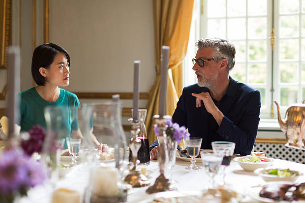 istock Luxury dinner, friends eating together 539811200