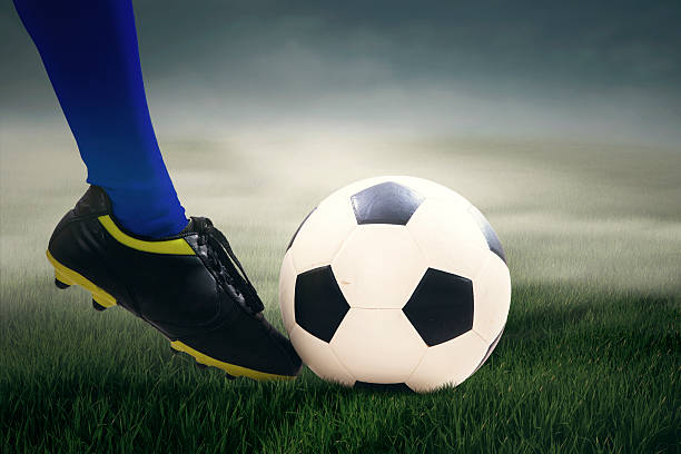 istock Soccer player kicking the ball 539811854