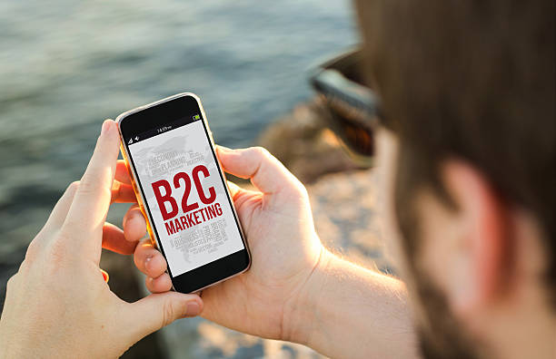 istock Man using his mobile phone  with b2c marketing on sc 539812422