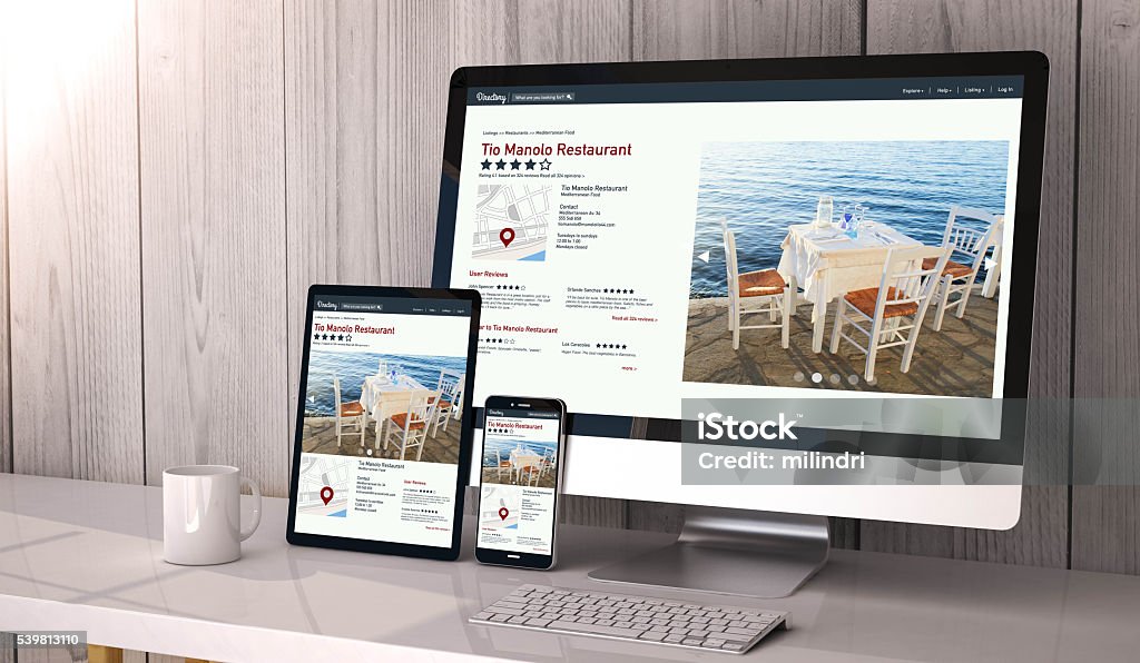 devices responsive on workspace online directory online Digital generated devices on desktop, responsive blank mock-up with online directory website  on screen. All screen graphics are made up. 3d rendering. Web Page Stock Photo