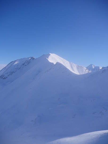 istock Winter snow covered mountain peaks in Europe. 539813502