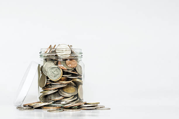 istock Glass jar full of coins, with copy space 539814066