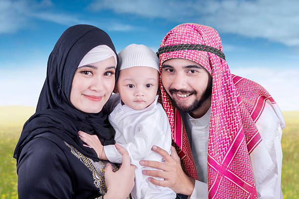 istock Middle eastern family smiling together at field 539814464