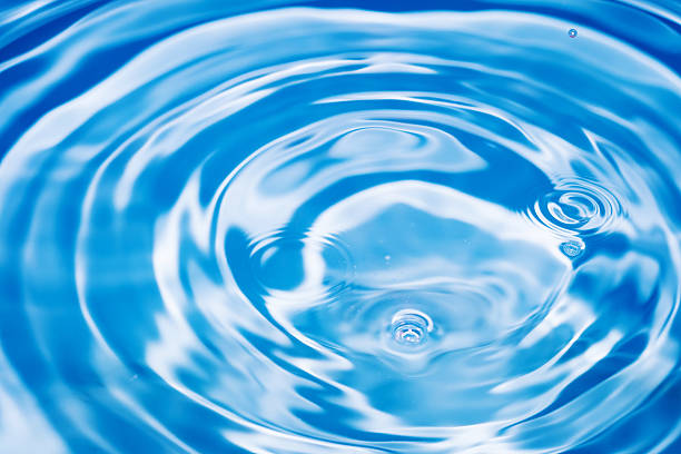 istock Abstract blue circle water drop ripple. Liquid texture with wate 539817720