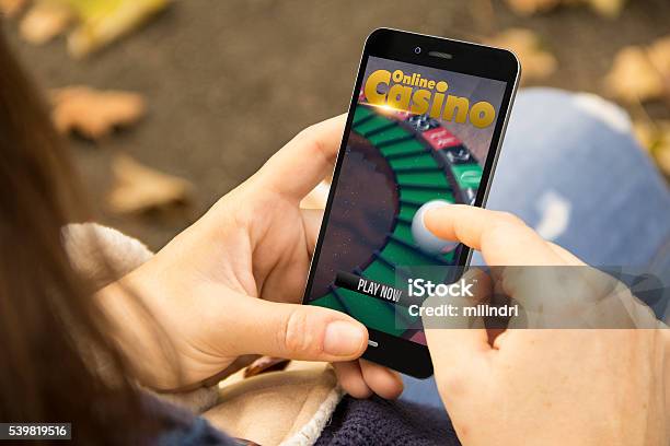 Woman With Online Casino Phone In The Park Stock Photo - Download Image Now - Casino, Internet, www