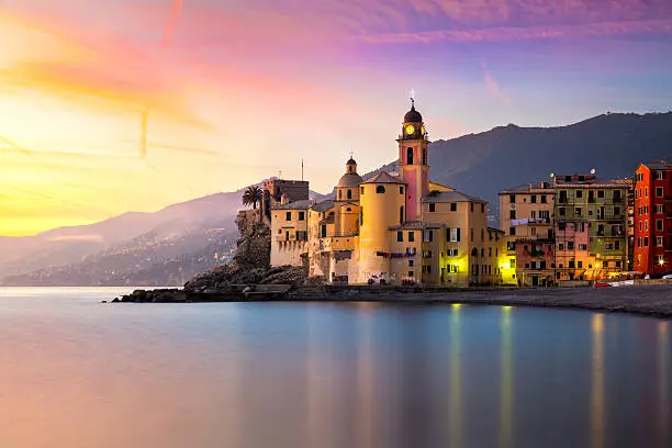 Beautiful Old Mediterranean Town at the sinrise time with illumination - Camogli, Italy, European travel