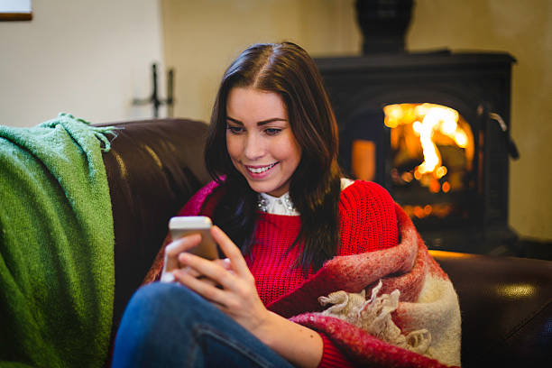 istock Cosying up with her Smartphone 539821004