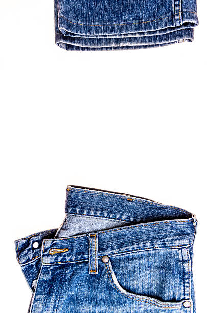 istock used blue jeans isolated on white background 539824322