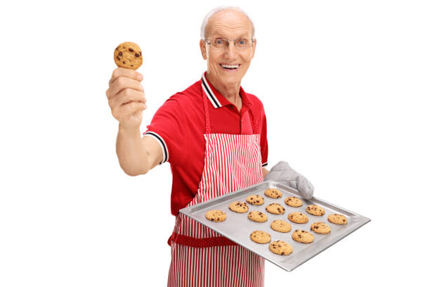 istock Senior showing his homemade cookies 539824950