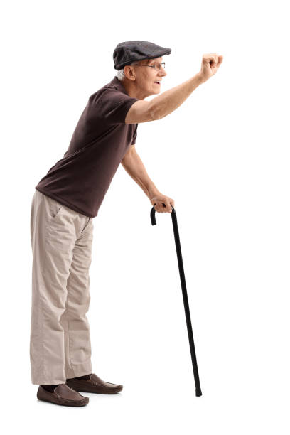 istock Senior preparing to knock on a door 539825142