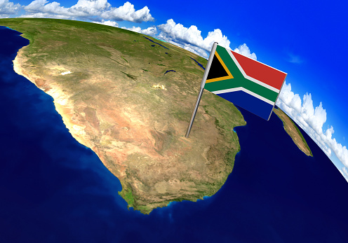 3D world render with the South African flag over the location of South Africa. Parts of this image furnished by NASA.