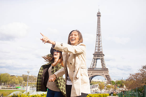istock Cheerful young women walking hand in hand 539826692