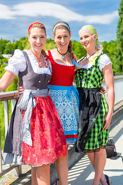 istock Friends visiting Bavarian fair having fun 539827576