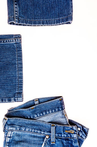 istock used blue jeans isolated on white background 539830052