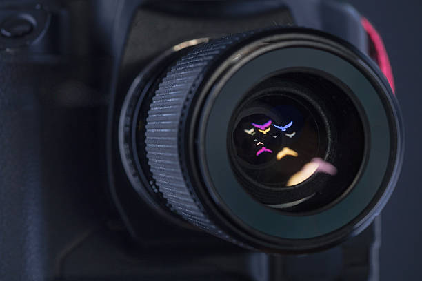 istock The diaphragm of a camera lens aperture. Color toned image. 539830106