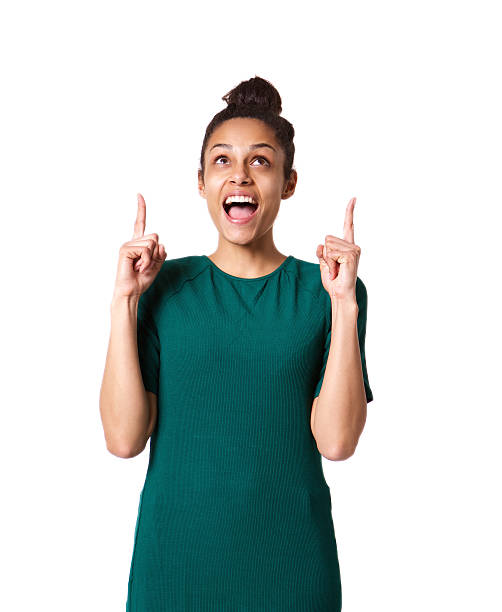 istock Surprised young african woman pointing up 539830732