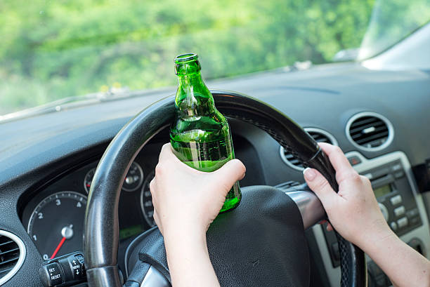 istock Woman drinking alcohol in the car. 539831752
