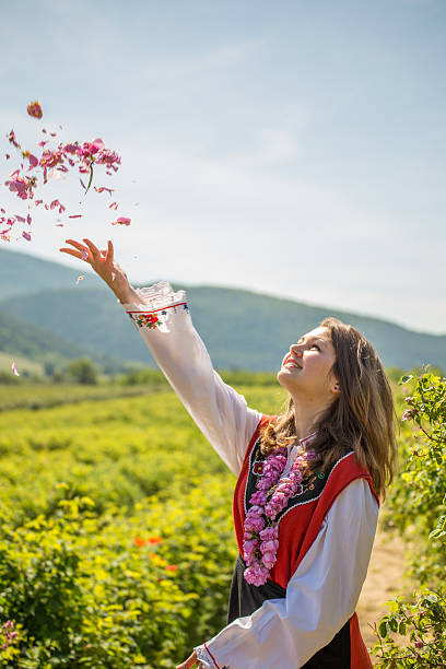 Throwing roses in the air stock photo