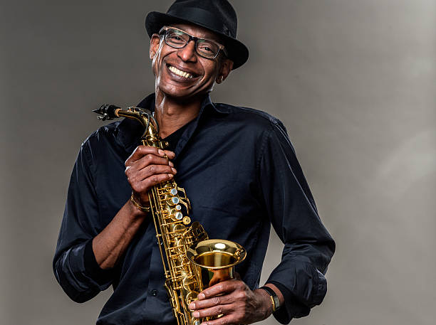 istock Musician with saxophone and big smile 539834740
