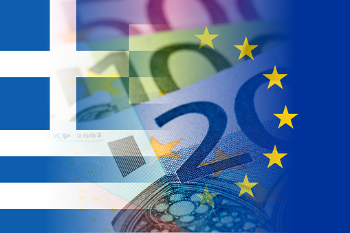 greece and eu flags with euro banknotes mixed image