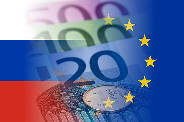 istock russia and eu flags with euro banknotes and ruble coin 539835246