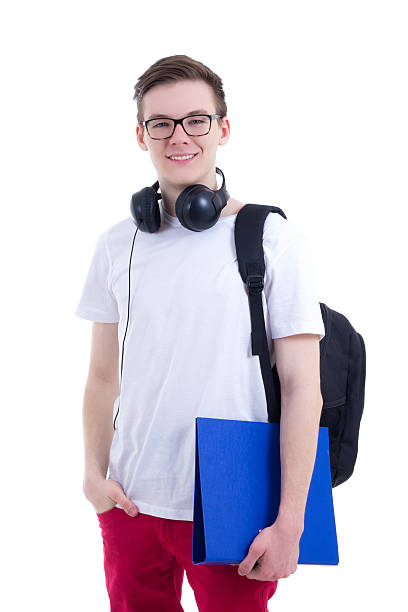 portrait of handsome teenage boy with backpack isolated on white stock photo