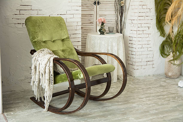 istock Green rocking chair on a background 539840042