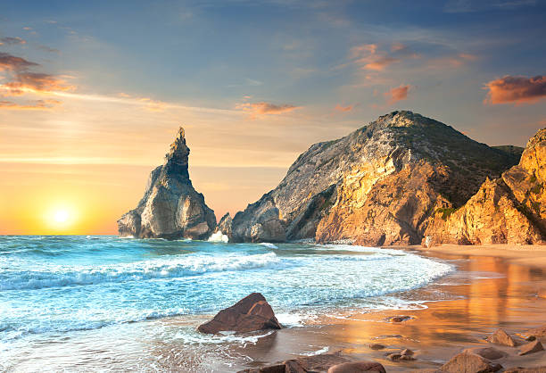 istock Ocean Landscape at Sundown, big rocks and stones beach 539841286