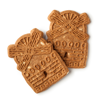 Traditional dutch speculaas cookies on white background