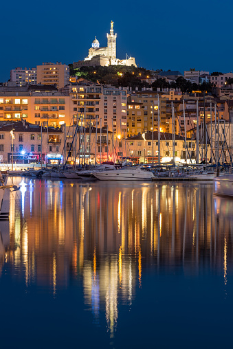 Basilica of Notre-Dame de la Garde from the harbour in Marseille, France, Europe.
