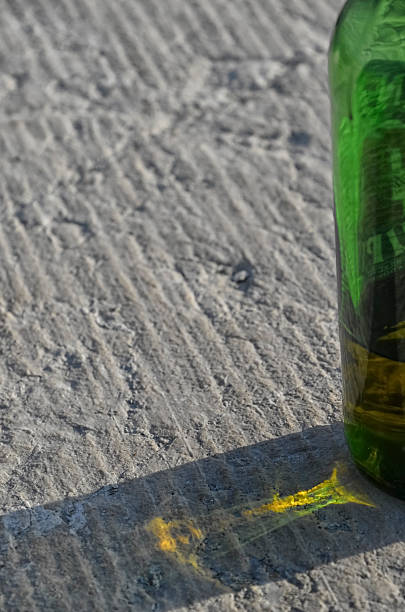 Colorful shadow of bottle on the rock
