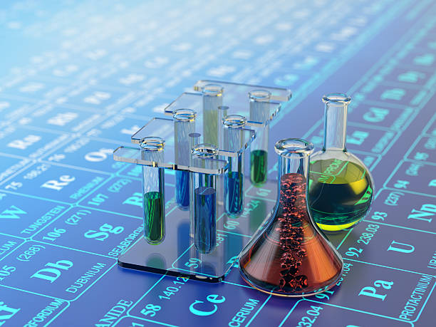 Chemical experiment, science research and chemistry concept Laboratory equipment: test tubes, flasks and bottles with multicolored liquids on blue background with periodic table of elements periodic table photos stock pictures, royalty-free photos & images