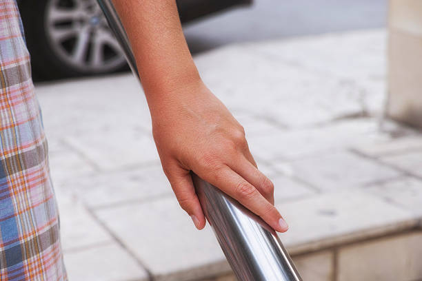 istock Woman hand on handrail 539843644