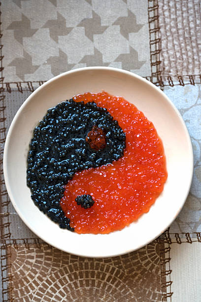 istock Red and black caviar laid on a plate 539845796