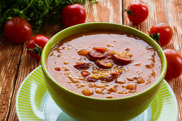 istock Soup: tomato soup with smoked sausage, tomatoes and lentil 539848084