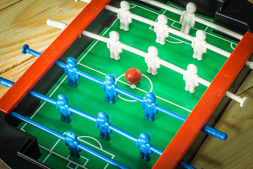 table football game.Soccer game toys On the wooden floor.Customize colors retro.table football game.Soccer game toys On the wooden floor.Customize colors retro.