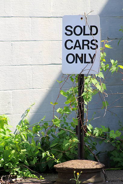 Sold Cars Only Parking Sign Bad Economy stock photo