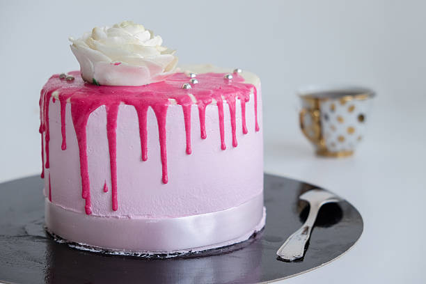 istock cake on white table near spoon and coffee cup 539851664