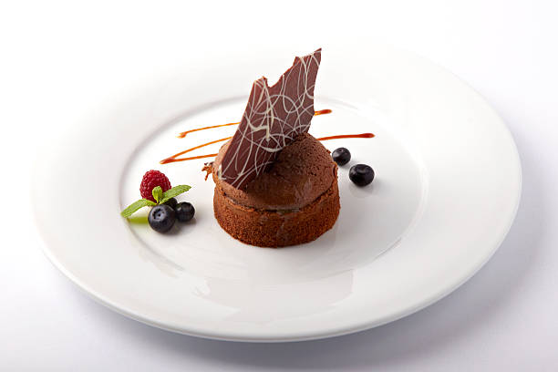 istock Chocolate cake with summer berries on a white background 539851700