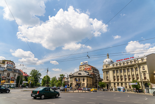 Bucharest, Romania - May 29, 2016: The Roman Square (Piata Romana) is one of the busiest and largest traffic intersections in downtown of Bucharest city.