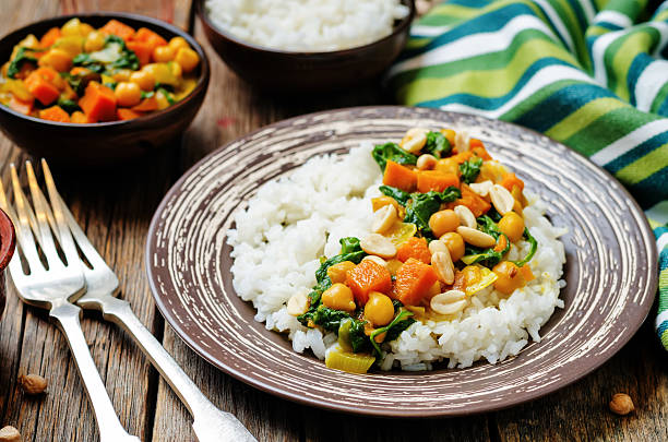 istock Sweet potato spinach chickpea curry with rice 539943360