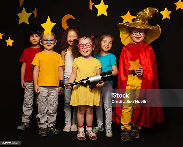 Six Kids In Stargazers Costumes With Telescope Stock Photo - Download Image Now - Child, Theatrical Performance, Stage Theater