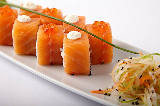 istock Plate of salmon sushi with lime and ginger 539943950
