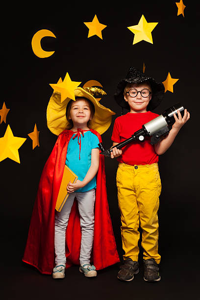 istock Five years old boy and girl playing sky watchers 539945306
