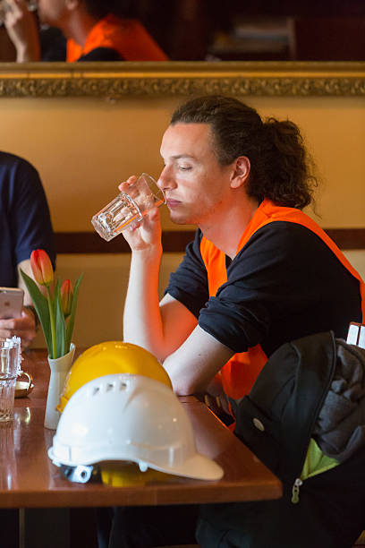 istock Profile portrait civil engineer drinking beer during break at restaurant 539945572