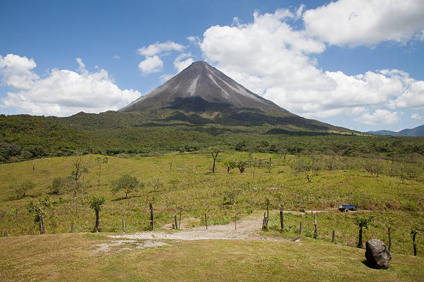 Volcano in Costa Rica through the rainforest.