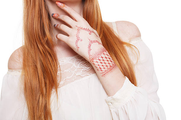 Boho hippie style young redhead woman isolated